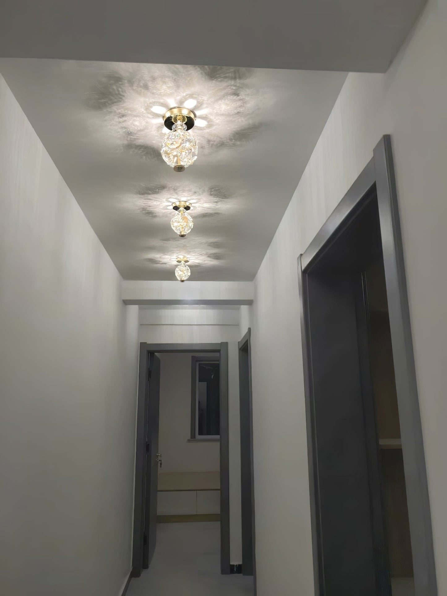 CrystalGlobe - Ceiling Lamp with Polished Crystal Sphere and Classic Design