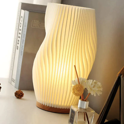 CalmGlow – Elegante Wave-Tischlampe