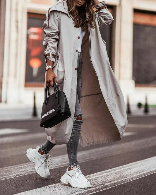 Chic Long Waterproof Coat for Women – Lightweight Rain Coat with Flattering Longline Design 0