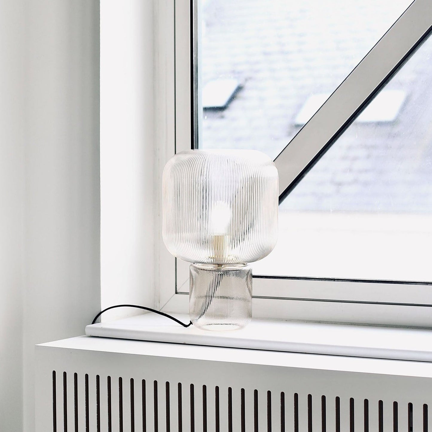 GlimmerOval – Stylish Glass and Metal Table Lamp