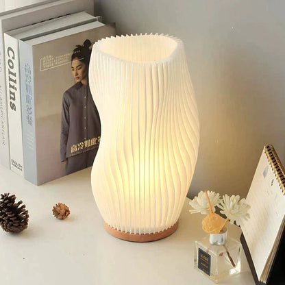 CalmGlow – Elegante Wave-Tischlampe