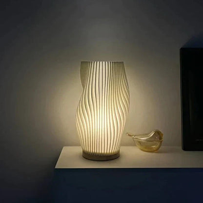 CalmGlow – Elegante Wave-Tischlampe