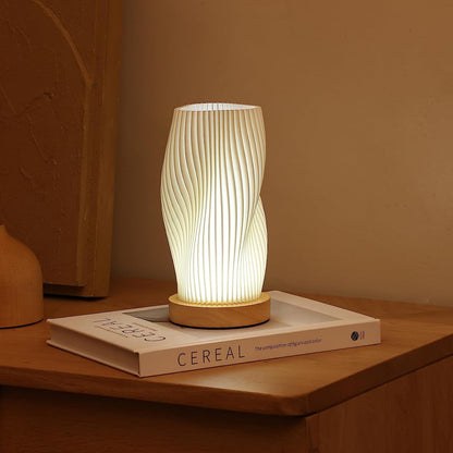 CalmGlow – Elegante Wave-Tischlampe